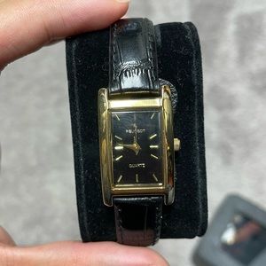 Black & gold rectangle watch